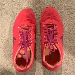 Pink Nike Free 5.0 gym shoes